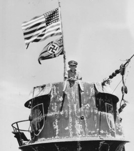 Daniel Gallery, Commanding Officer of the Guadalcanal on the Conning Tower of the captured U-505. Photo by USN (June 1944). PD-US Government. Wikimedia Commons.